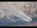 One of the Expedition 36 crew members aboard the International Space Station used a 50 mm lens to record this view of the massive drought-aided Rim Fire in and around California's Yosemite National Park and the Stanislaus National Forest on August 26. (NASA photo)